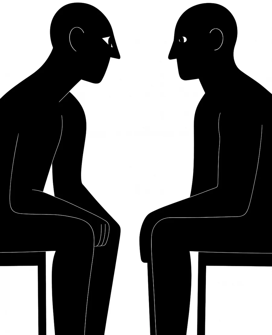 Two figures in conversation, representing coaching and reflection